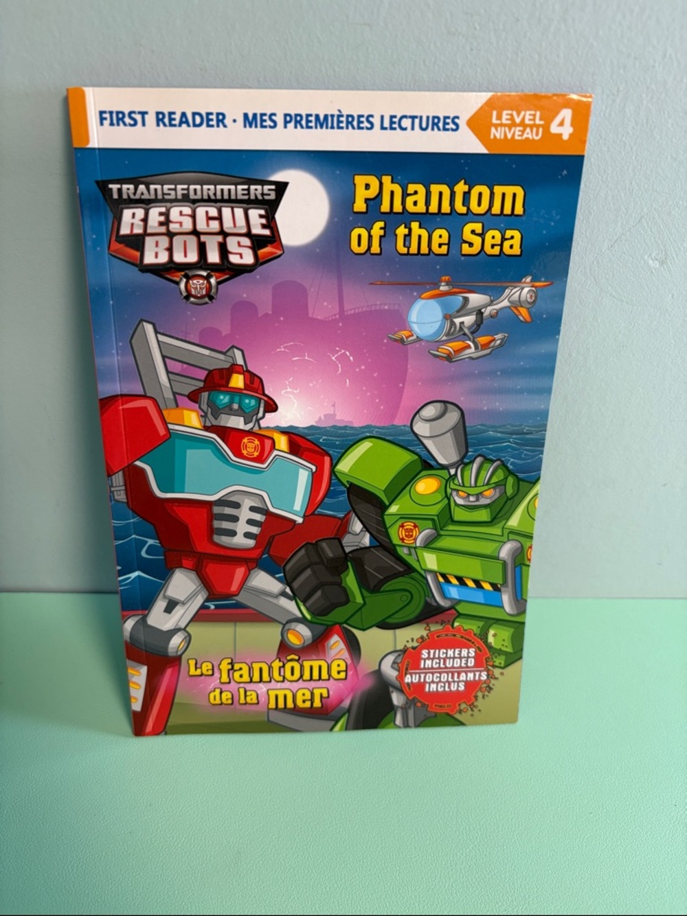 Transformers Rescue Bots Phantom of the Sea, First Reader Level 4,Bilingual Book
